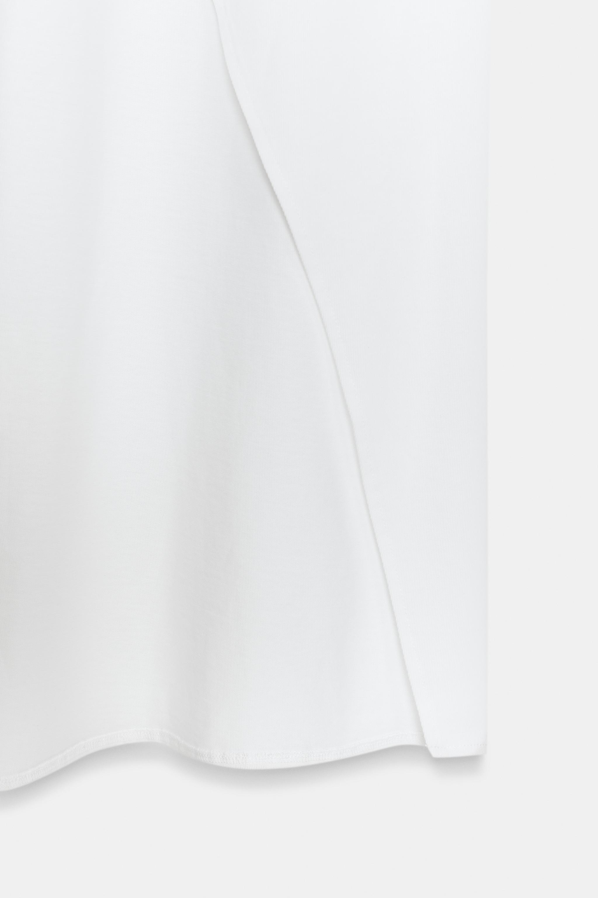 ASYMMETRIC LONG TOP